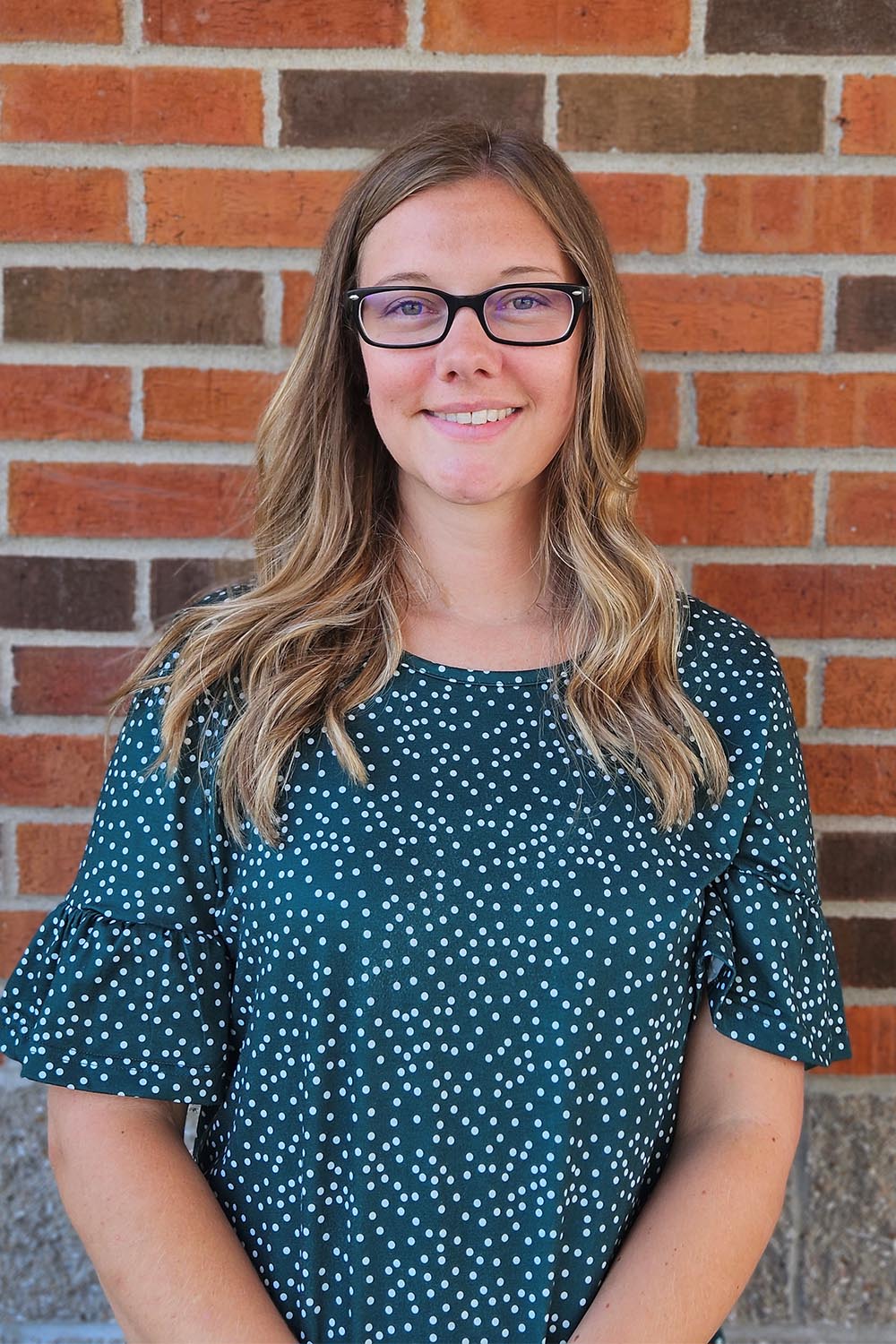 Caitlin Volkmann, Office Coordinator